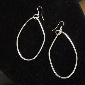 Stunning rhodium plated oval ish dangling hoops